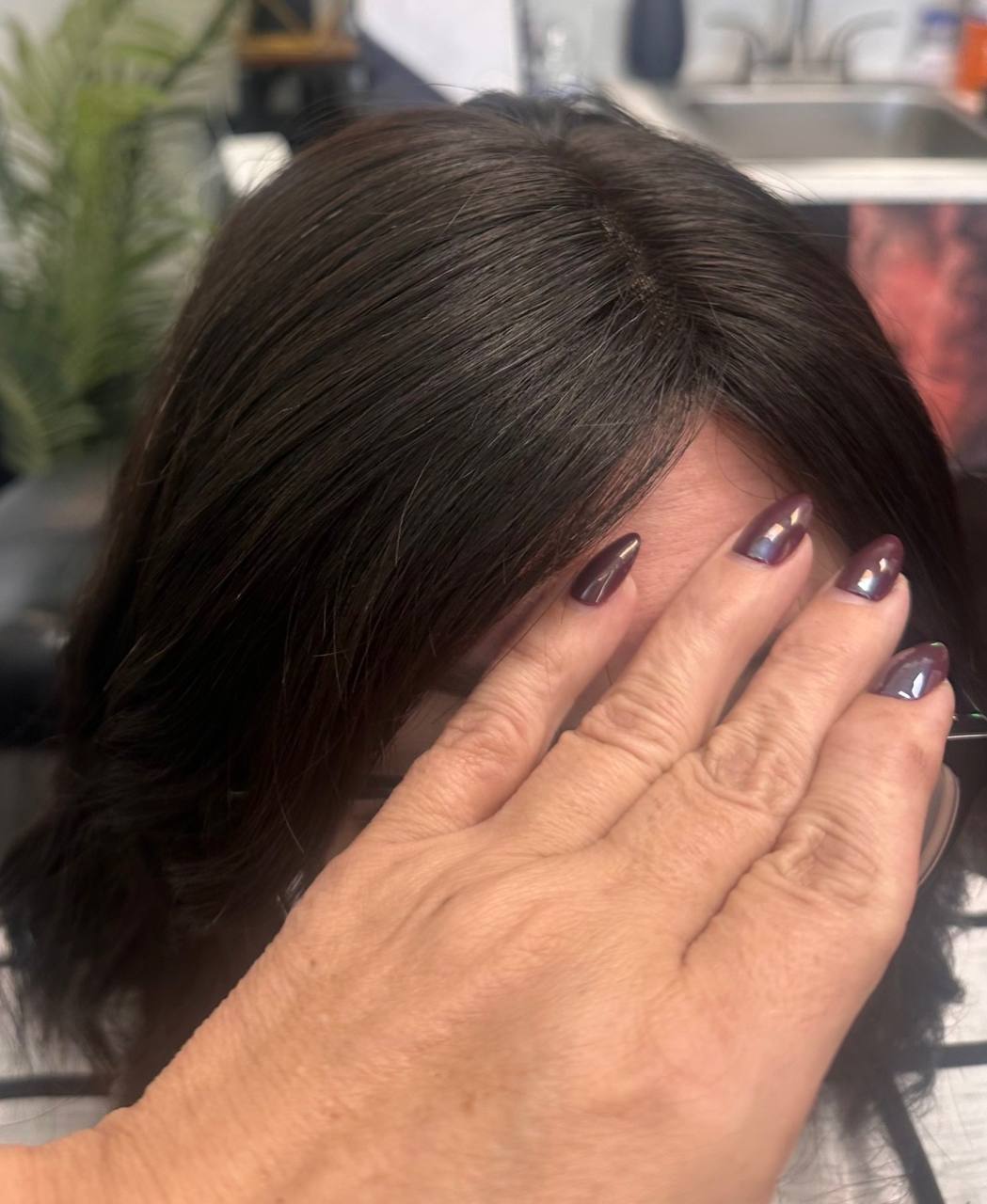 After — full dark hair with seamless natural part